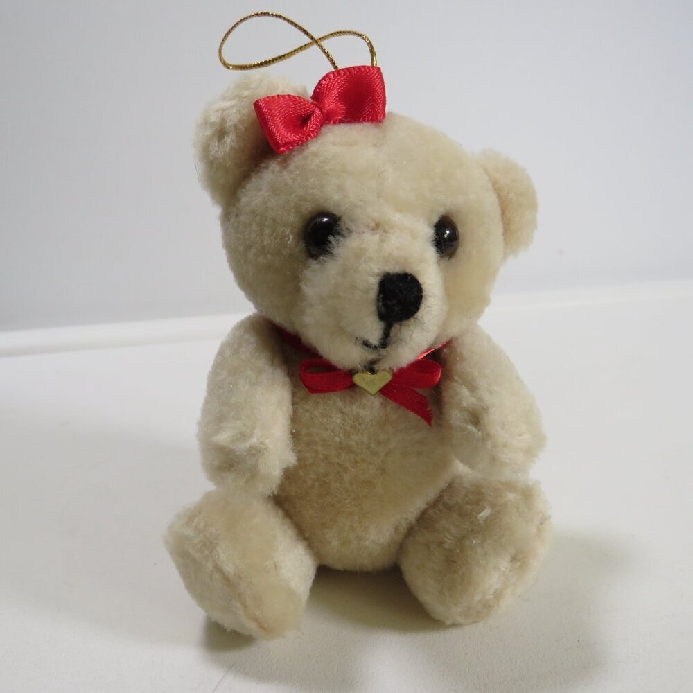 Small Vintage tan Teddy Bear with moveable joints with ear bow